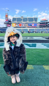 Young Eagles fan wearing a kids wildcoat at a philadelphia eagles game