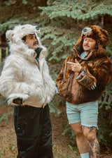 Two guys wearing Wildcoat bomber jackets, one in the white polar bear bomber and one in the brown grizzly bear bomber
