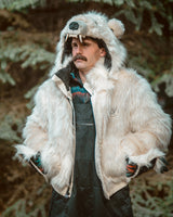 Wildcoat Polar Bear Bomber Coat with male model, hands in pockets with clawed mittens flipped back