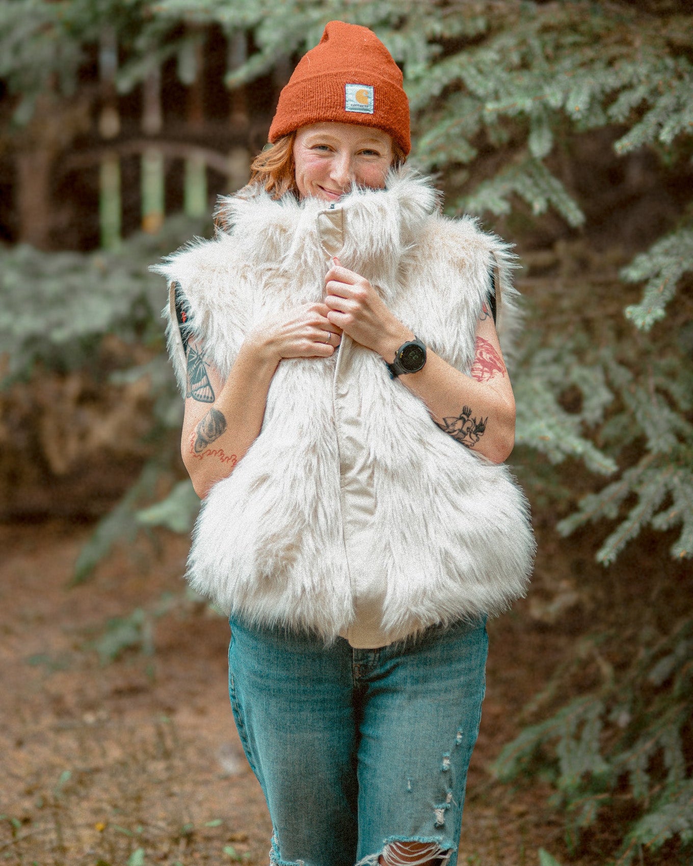 The Wildcoat Polar Bear Bomber on female model with sleeves and hood detached