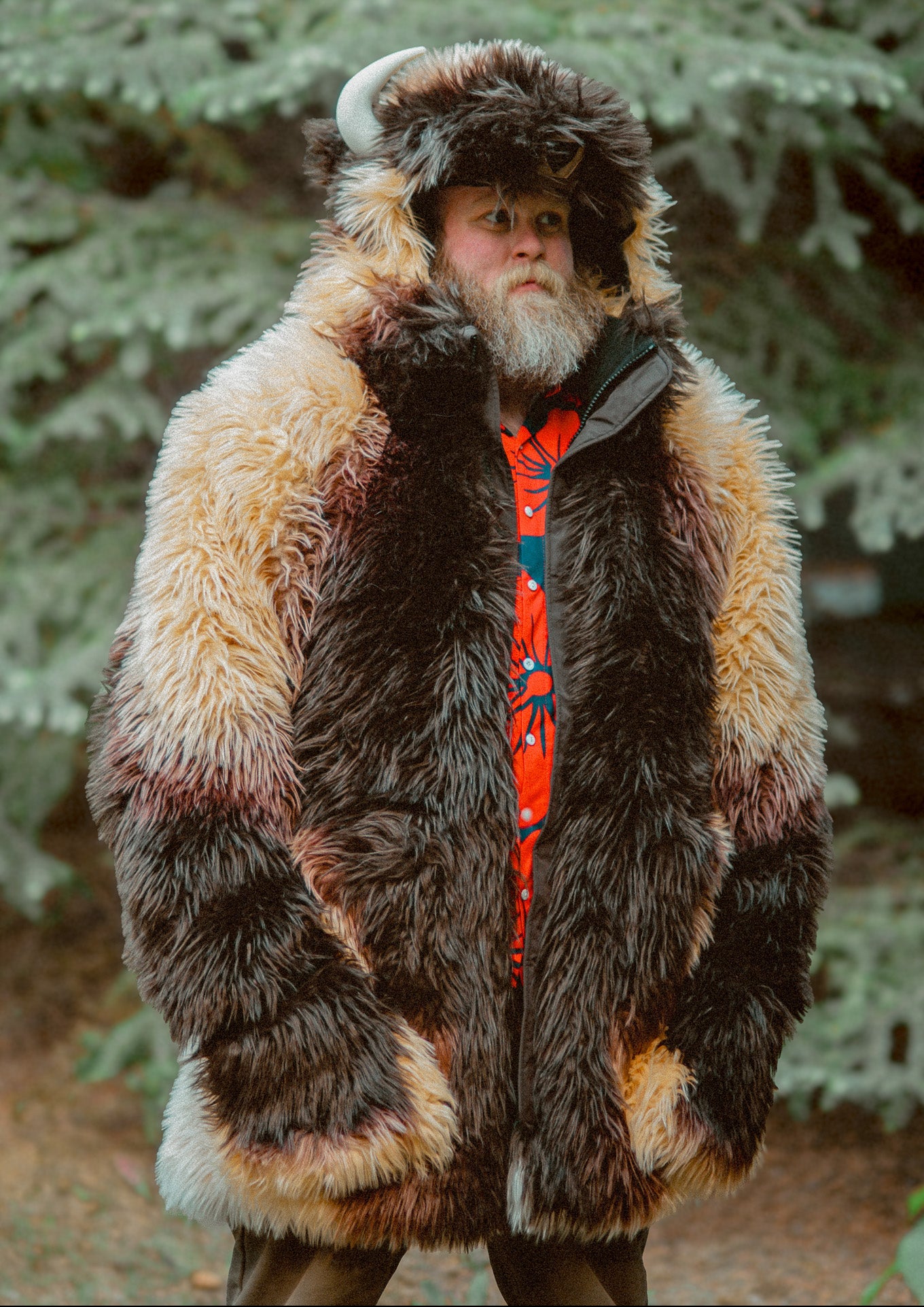 A man with a beard wearing the wildcoat great white buffalo coat worn