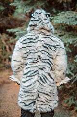 Man wearing wildcoat white tiger parka showing off the back of the coat with intricate tiger stripe pattern