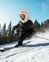 The wildcoat eagle parka v6 shown skiing 