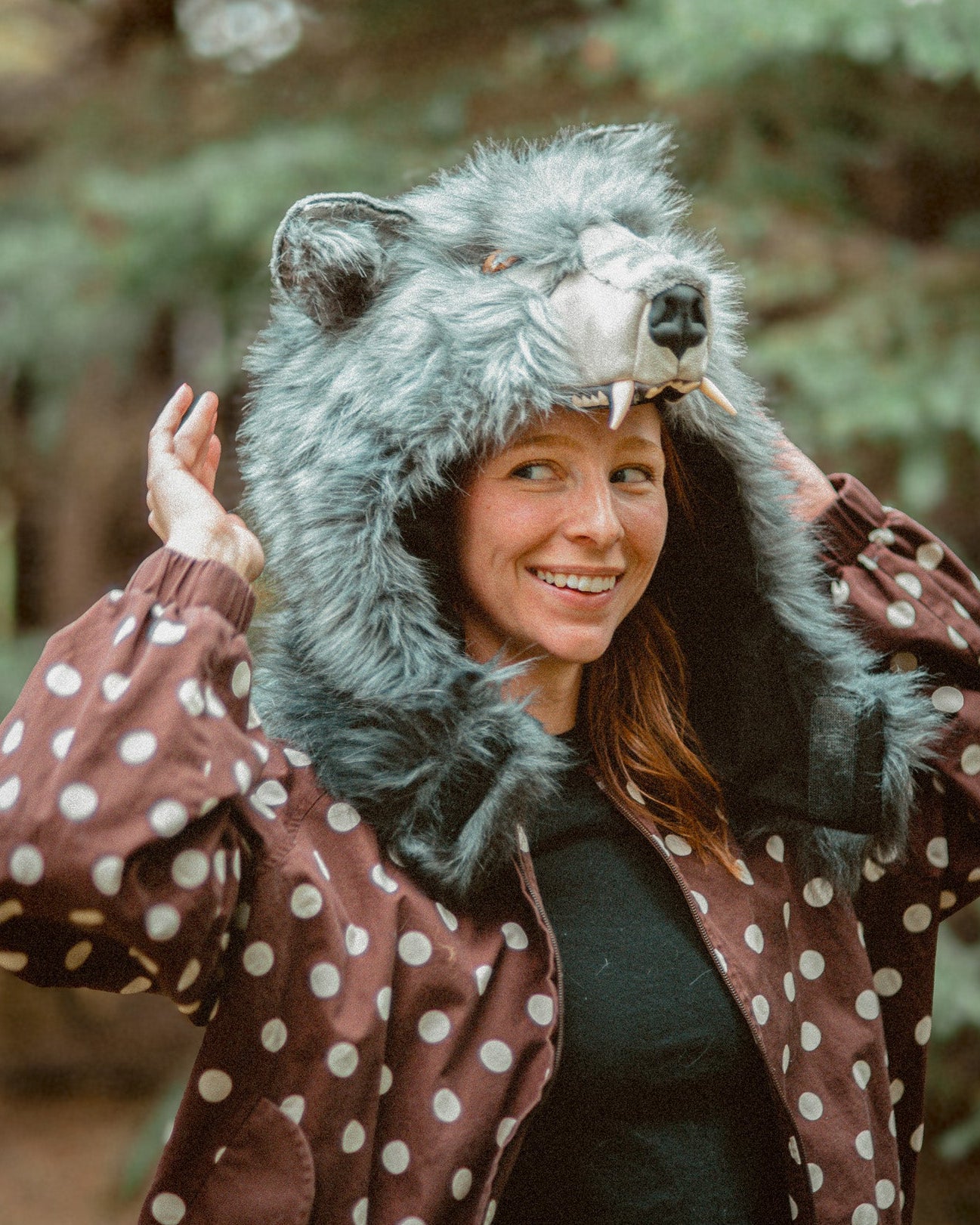 woman smiling while wearing wilcoat timberwolf howl cowl uncinched
