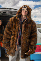 man wearing a faux fur grizzly bear parka coat at a chicago bears tailgate