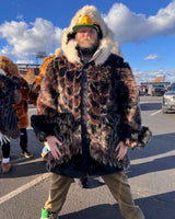 the wildcoat eagle parka v6 shown on a handsome fan at the phildalphia eagles tailgate in the parking lot