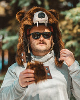 The wildcoat grizzly bearaclava v6, holding the collar extender to show the attachment
