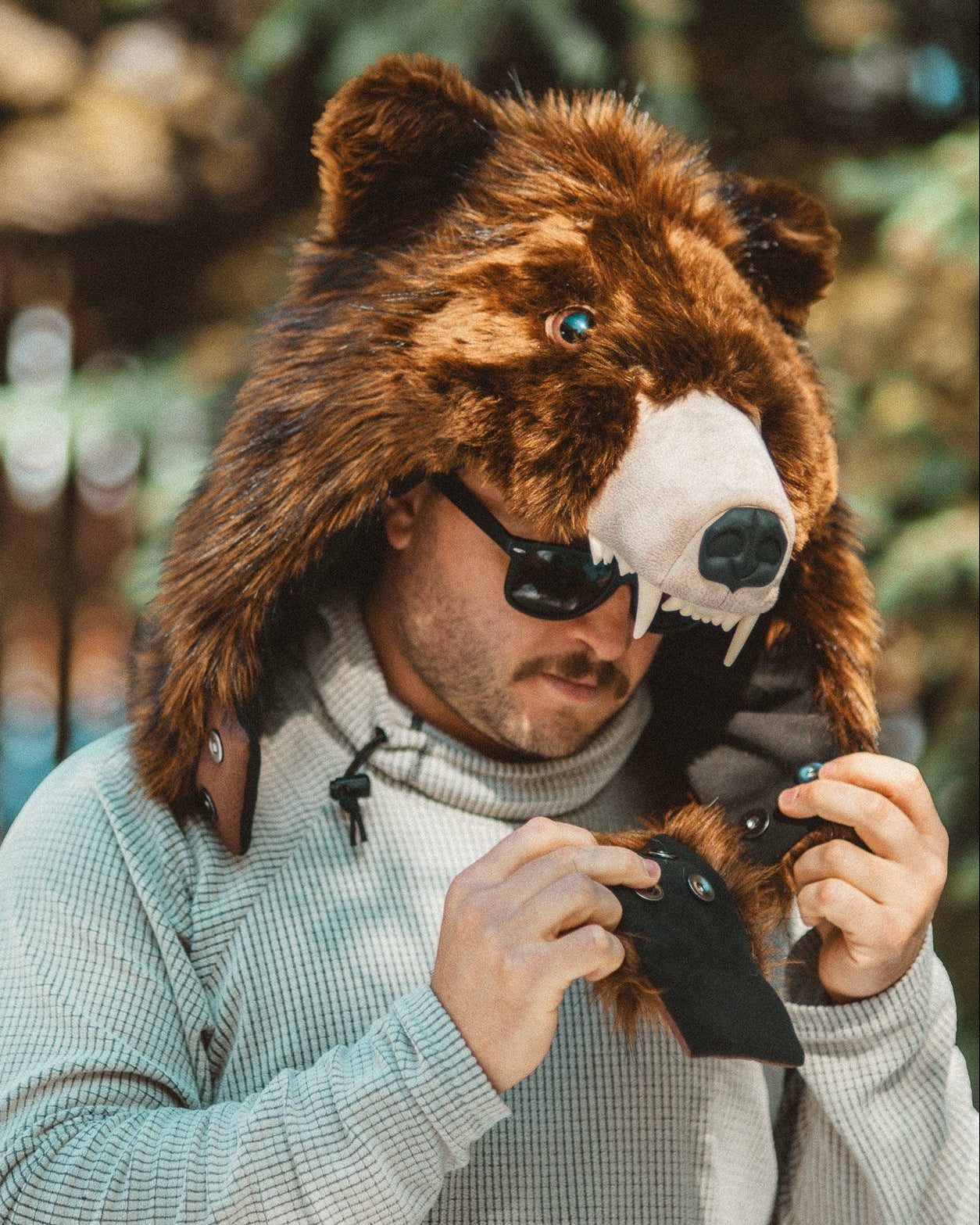 The wildcoat grizzly bearaclava v6, worn unfastened and showcasing the collar extender