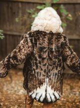 The wildcoat eagle parka v6 showing the beautiful fur and feather pattern on the back of the coat