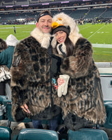 The wildcoat eagles parka v6 shown at a philadelphia eagles game on two fans