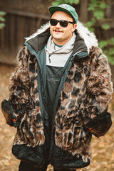 The wildcoat eagle parka v6 shown unzipped with hood down with eagles hat